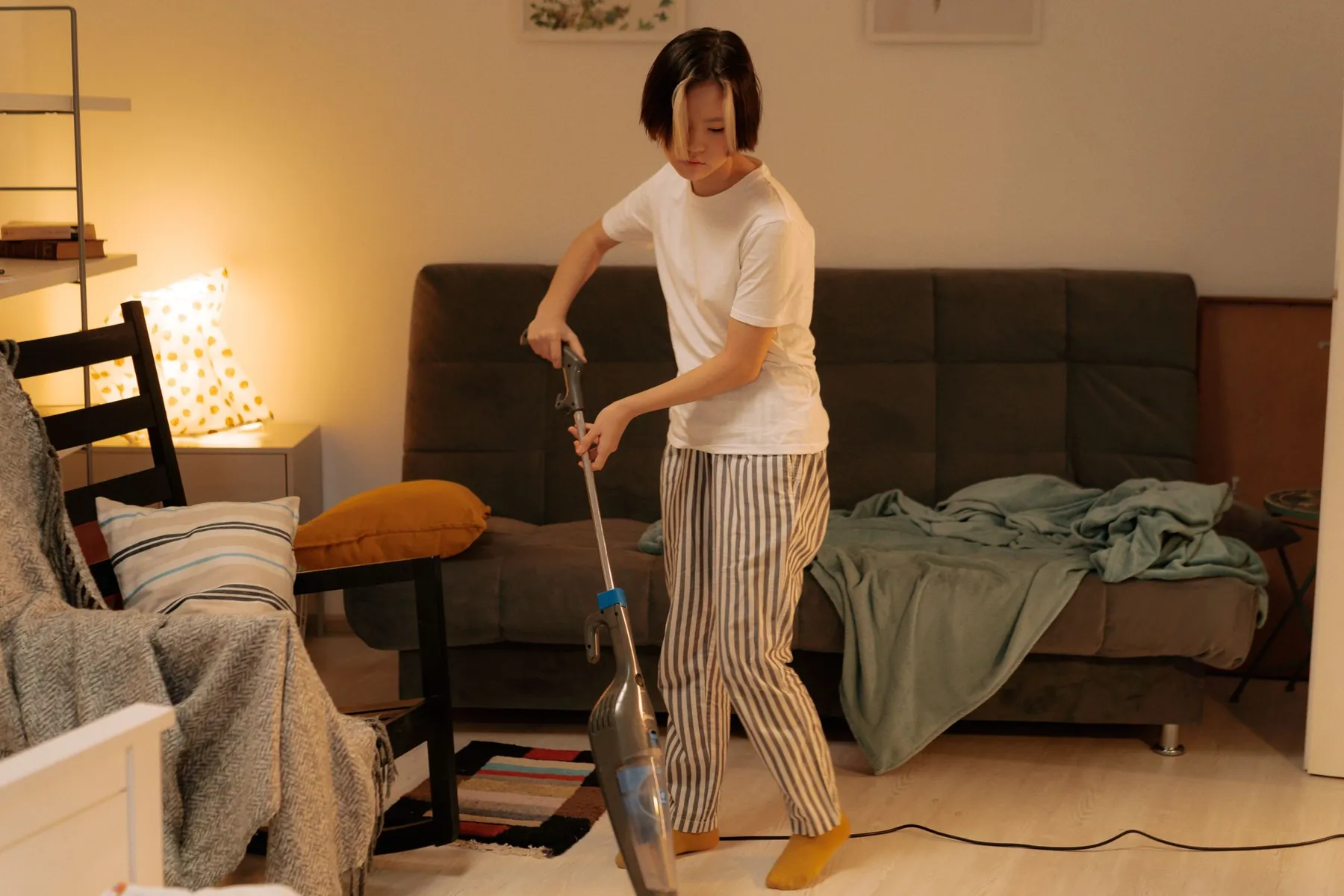 Vacuuming a cosy living room